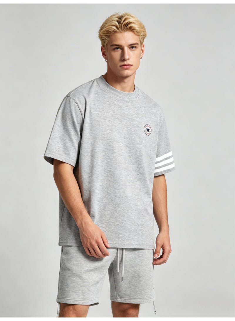 كونفرس Converse Men’s Heather Grey Crew Neck Short Sleeve Tee with Circular Star Logo & Three White Sleeve Stripes - Image 2