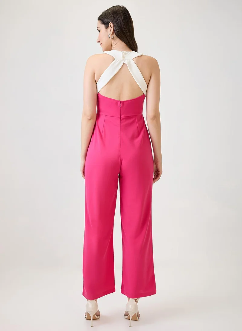 Globus pink Globus Women's Pink Halter Neck Party Jumpsuit with Stylized Back for Women | Best Price UAE
