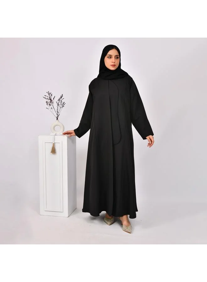 HAWRAA ABAYA Black abaya with formal design and side piece that closes with hidden buttons