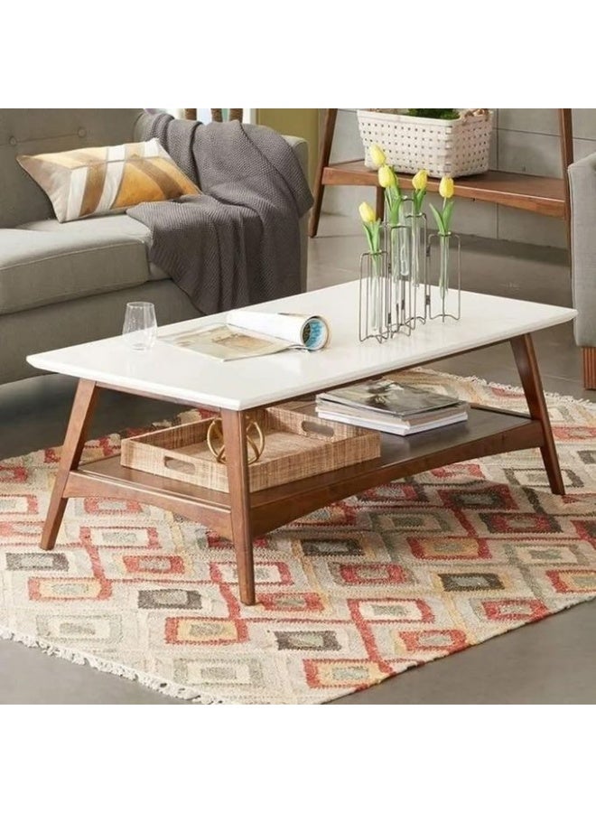 An elegant rectangular coffee table that combines pure white with natural honey-colored leg details, adding warmth and simplicity.