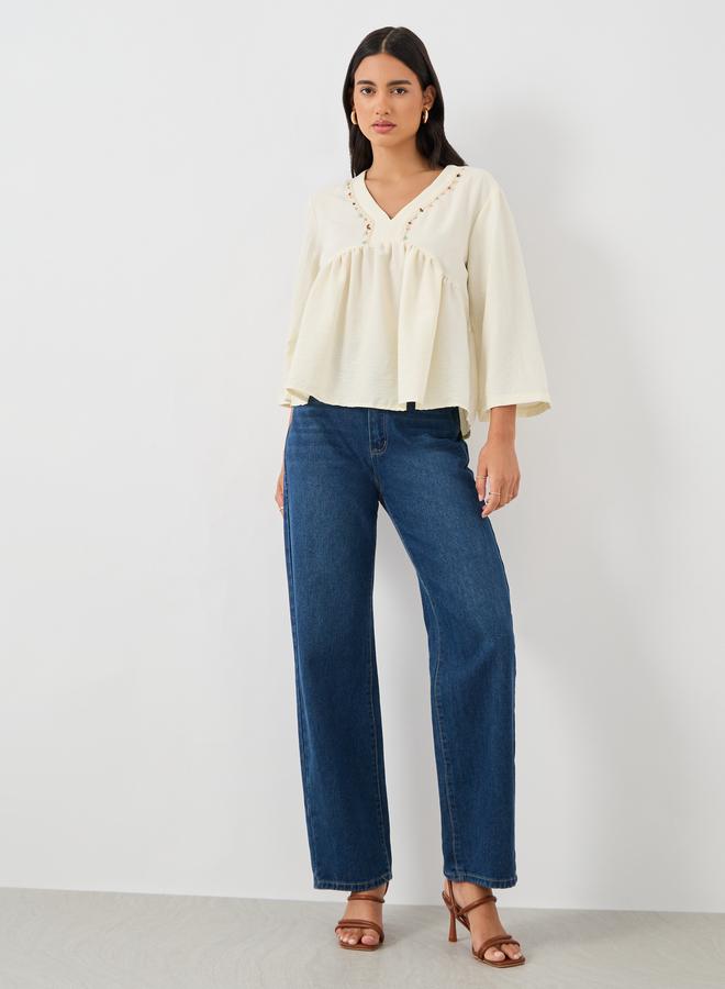 ستايلي بلوزة بيبلوم بياقة على شكل حرف  وتفاصيل دانتيل مزينة - Image 2