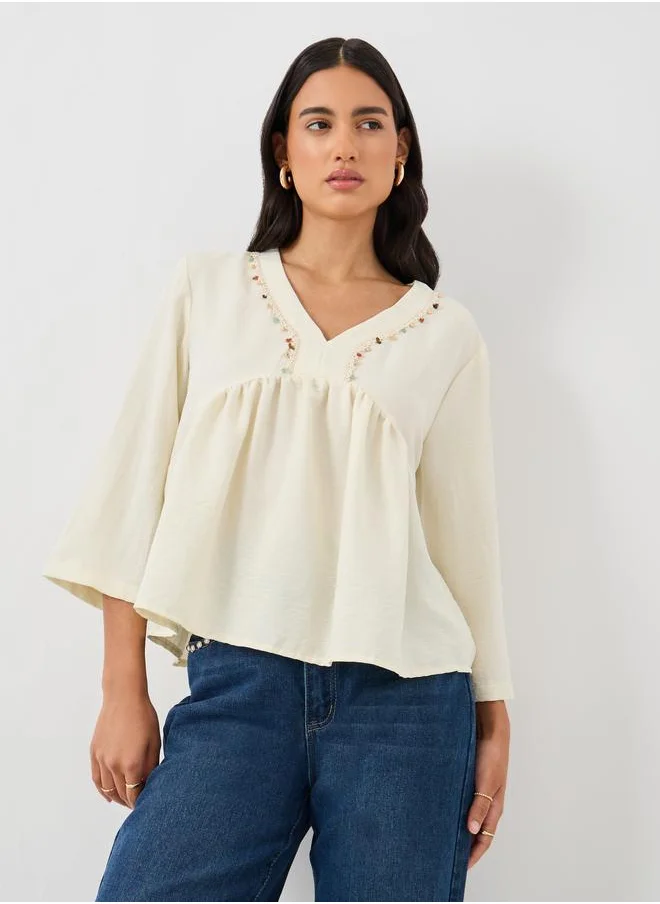 ستايلي Styli Embellished Lace Detail V-Neck Peplum Blouse
