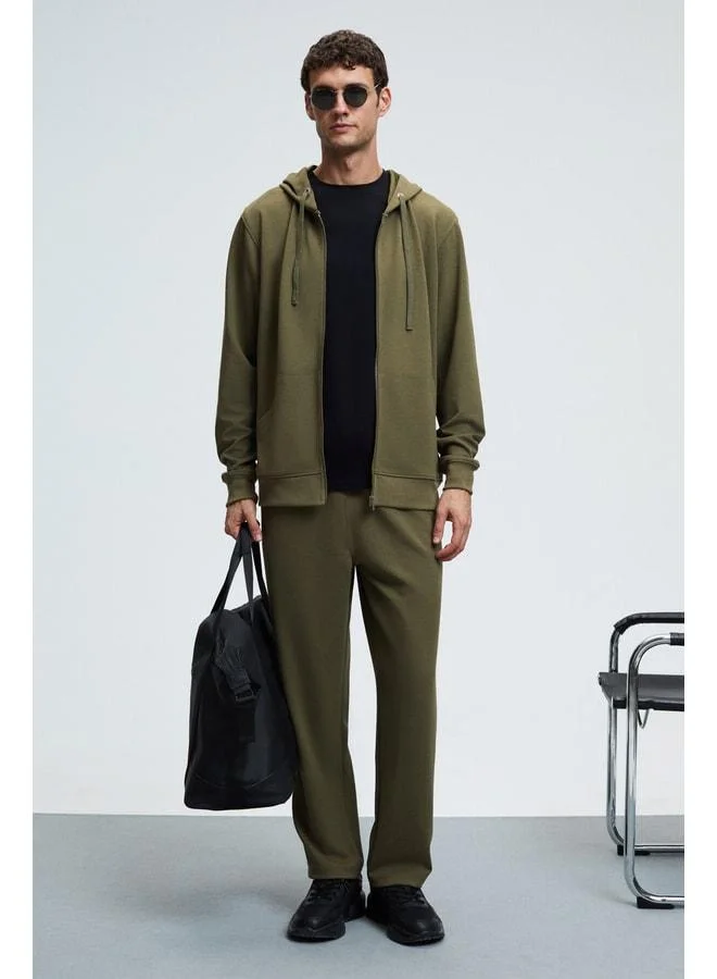 GRIMELANGE GAGE Men's Hooded Khaki Sweatshirt with Metal Bird's Eye Detail, Zipper, Cord, and Pocket.