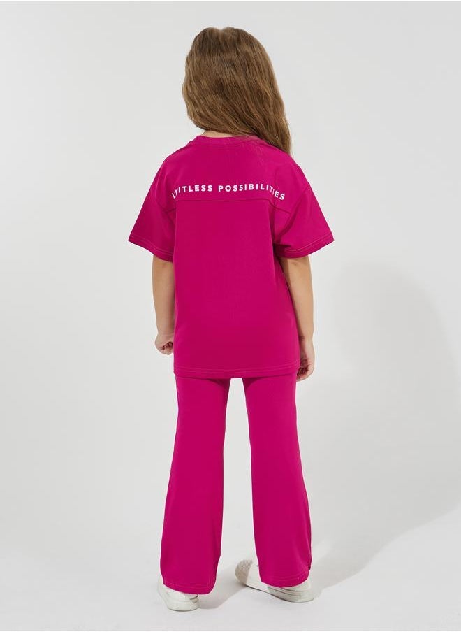 Styli Slogan Print Oversized T-Shirt & Flared Pants Set  - Image 2