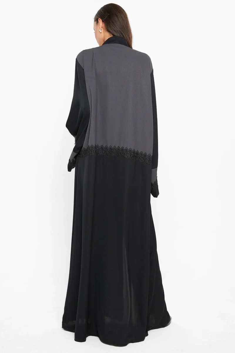 NUKHBAA A casual abaya in black and grey with black lace detailing -AJ578A