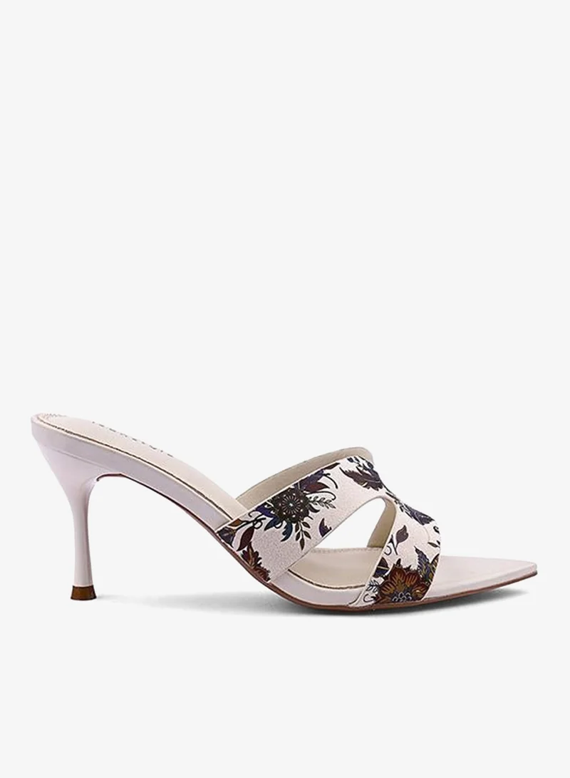 أيقون صنادل نسائية بكعب وطبعات زهور