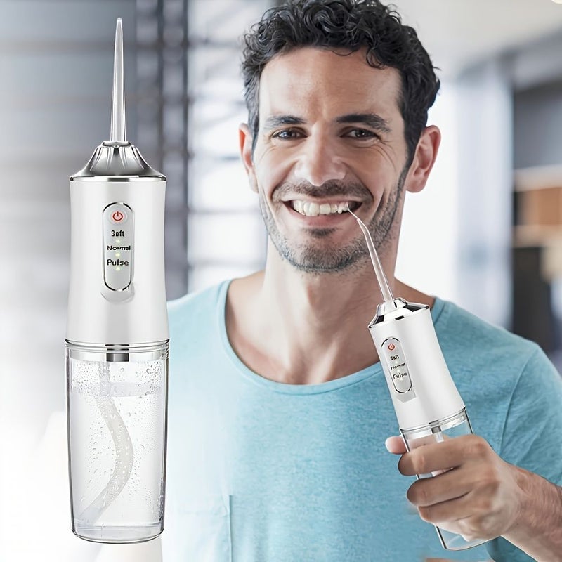White Rechargeable Electric Water Flosser with Multiple Rotating Nozzles - Image 1