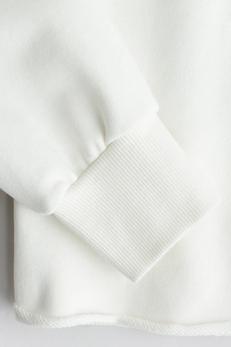 اتش اند ام هودي قصير مزين بطبعة