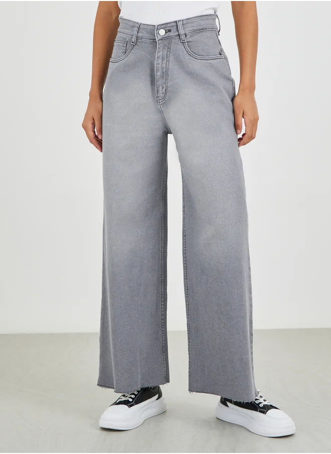 ستايلي Styli High Rise Kick Flare Jeans with Raw-Edge Hem