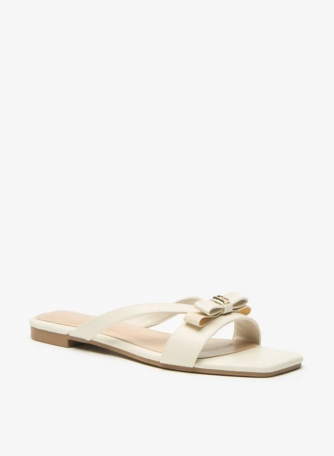 فلورا بيلا من شو إكسبرس Women Bow Accent Slip-On Flat Sandals