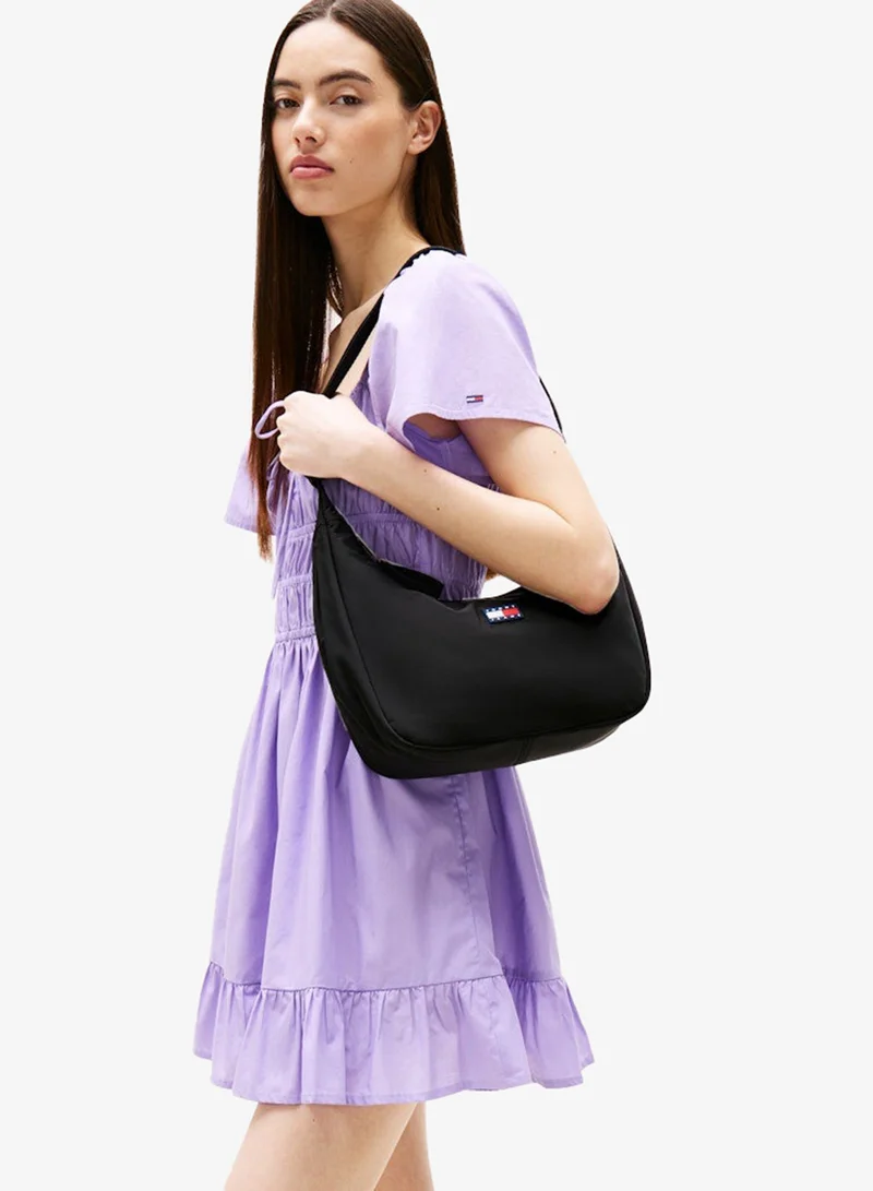 تومي جينز حقيبة كروس بودي بشعار