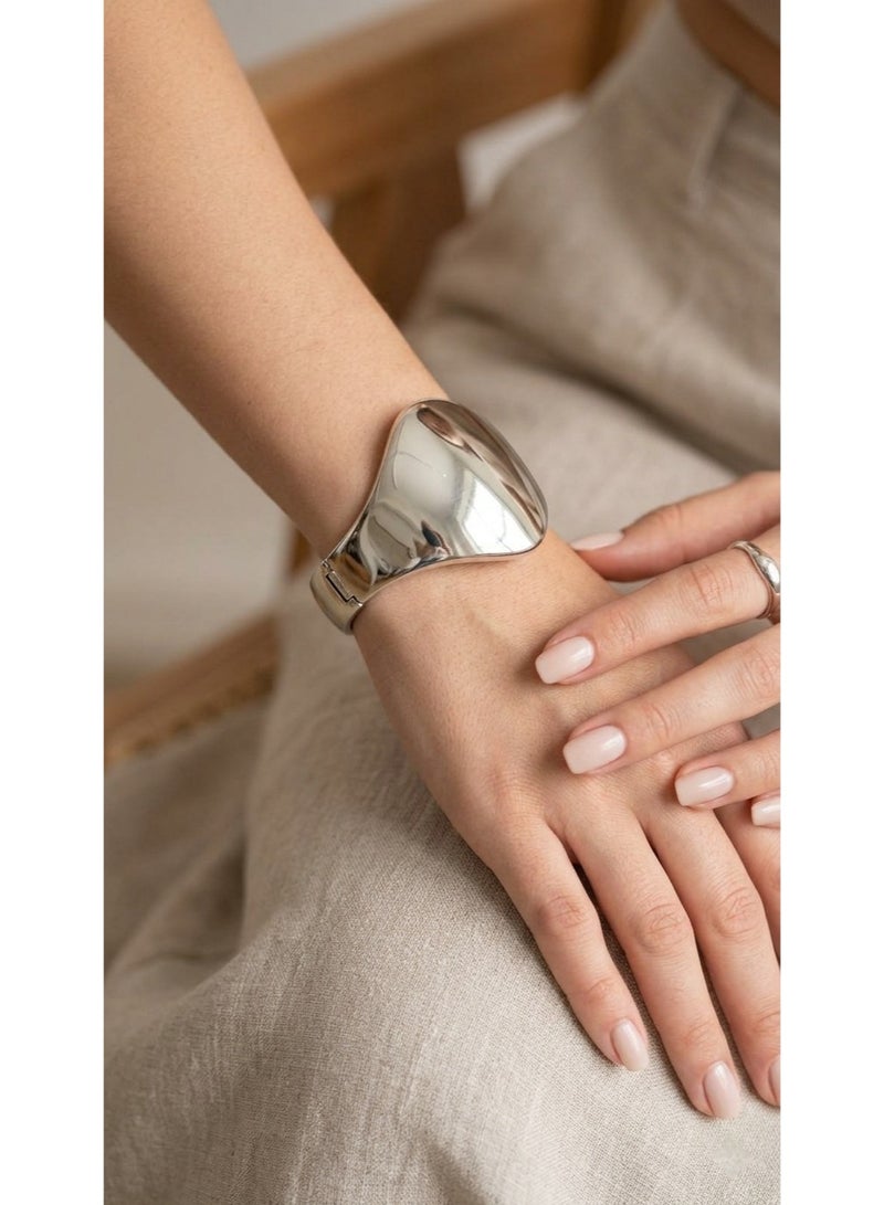 A modern silver cuff bracelet for a bold and striking look