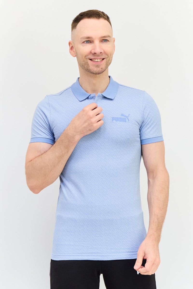 PUMA قميص بولو خارجي بأكمام قصيرة للرجال بتصميم ضيق مع شعار مطرز، أزرق فاتح - Image 1