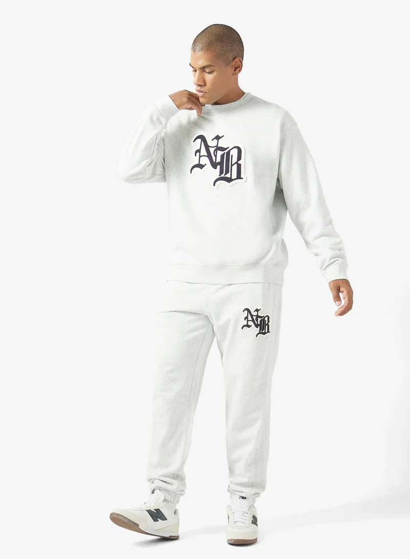 New Balance ASH HEATHER (AHH) Varsity Old English Sweatshirt for Men | Best Price UAE