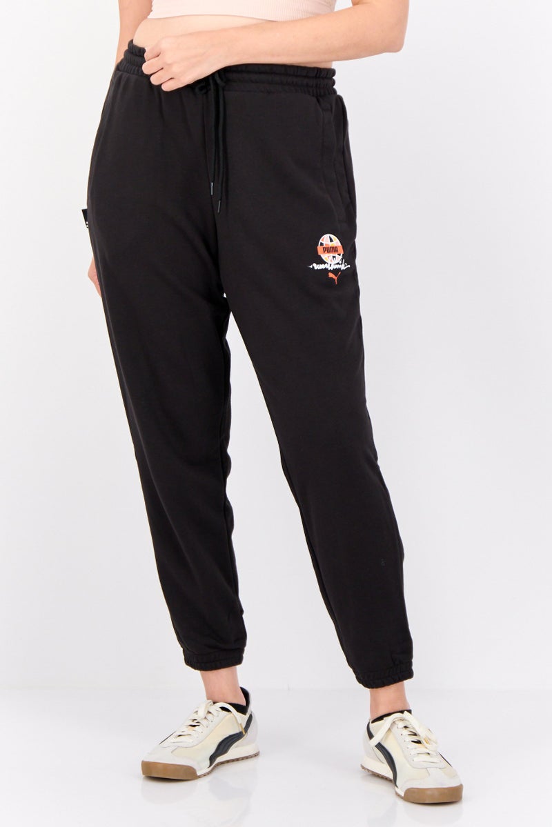 PUMA Women Sportswear Fit Outdoor Sweatpants, Black - Image 1