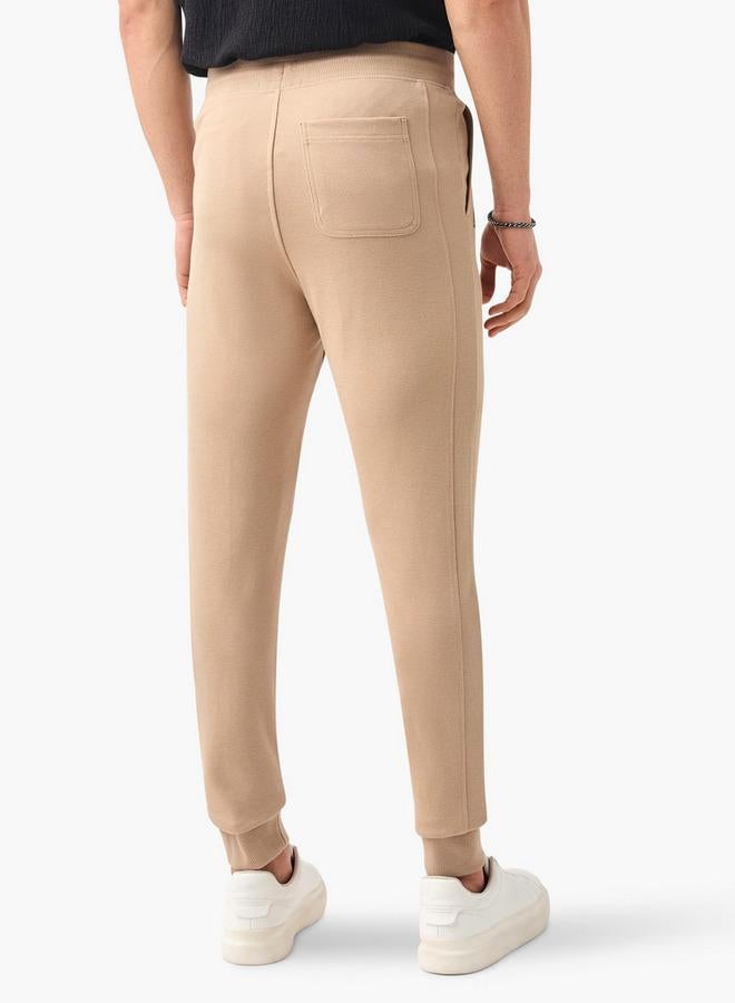 ايكونيك بنطلون جوجر بقصة ضيقة بتفاصيل متباينة مع رباط وجيوب - Image 3