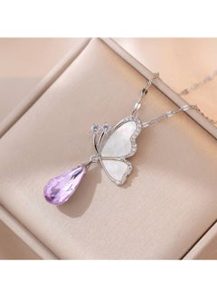 Generic An elegant silver stainless steel necklace with a butterfly design, embellished with a pink teardrop-shaped crystal, sparkling stones, and a silver frame. A delicate piece that adds a touch of femininity and beauty, perfect for adding elegance to your look." 