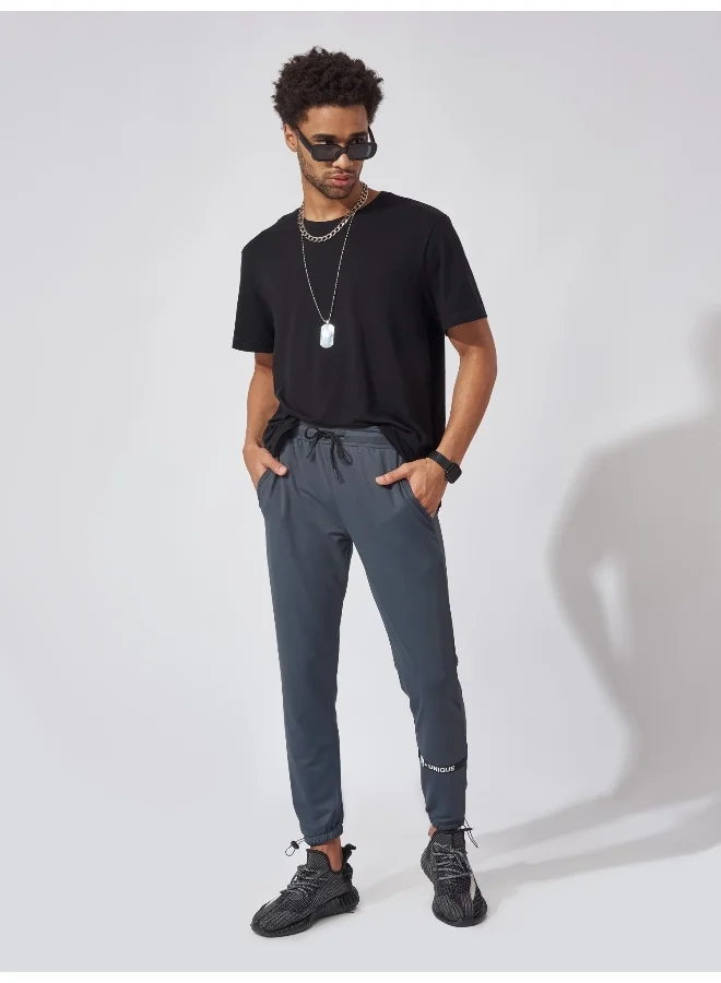 Maniac Maniac Men Printed 95% Polyester 5% Lycra French Terry fabric Dark Grey Slim Fit Trackpant