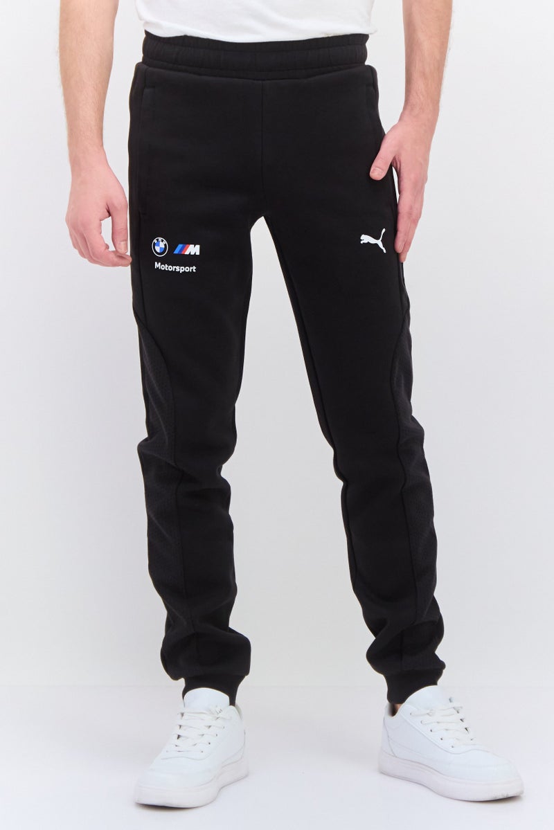 PUMA بنطلون رياضي للرجال من بومّا x بي إم دبليو للسباقات، أسود - Image 1