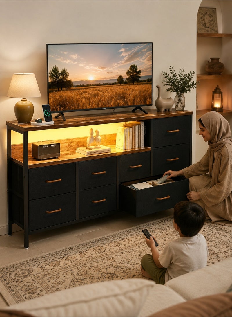 قف طاولة تلفزيون مع إضاءة RGB LED ومنفذ شحن، خزانة تخزين بـ 6 أدراج قماشية، وحدة تلفزيون مقاس 52 بوصة مناسبة حتى 60 بوصة، رف مفتوح، سطح خشبي، هيكل معدني، أسود وبني خشبي - Image 1