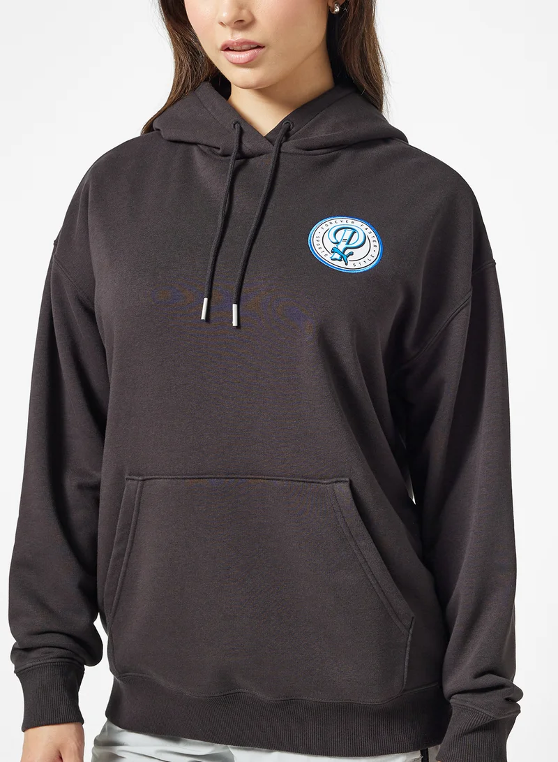 PUMA Sports Legacy Relaxed Women's Graphic Hoodie