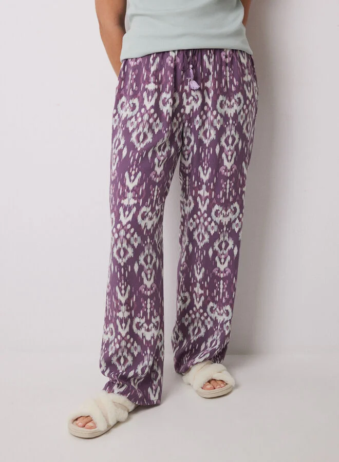 women'secret Long viscose trousers with ikat print