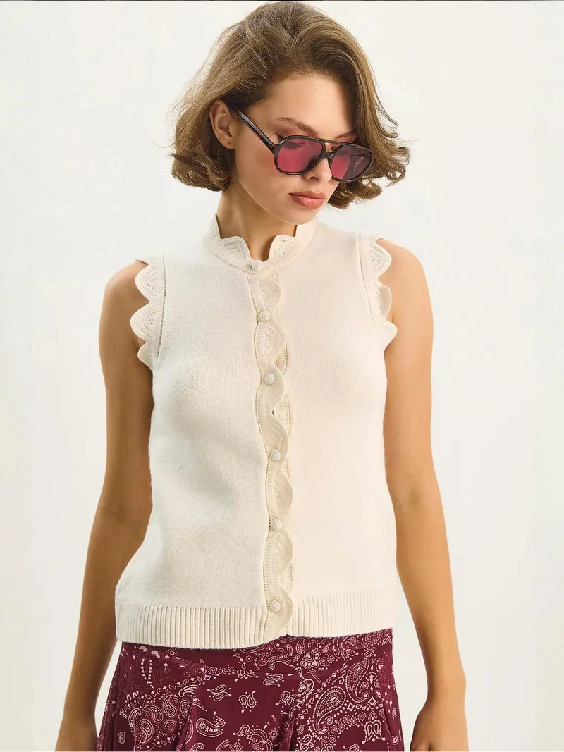 LUCCI Frilly Crew Neck Knit Waistcoat