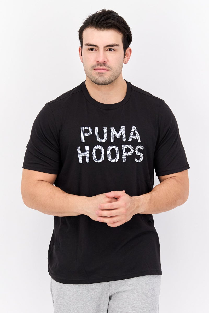 PUMA Men Sportswear Fit Short Sleeve Outdoor T Shirt, Black - Image 1