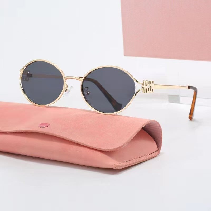 Prada miu miu Italian-made oval luxury cycling sunglasses for women.