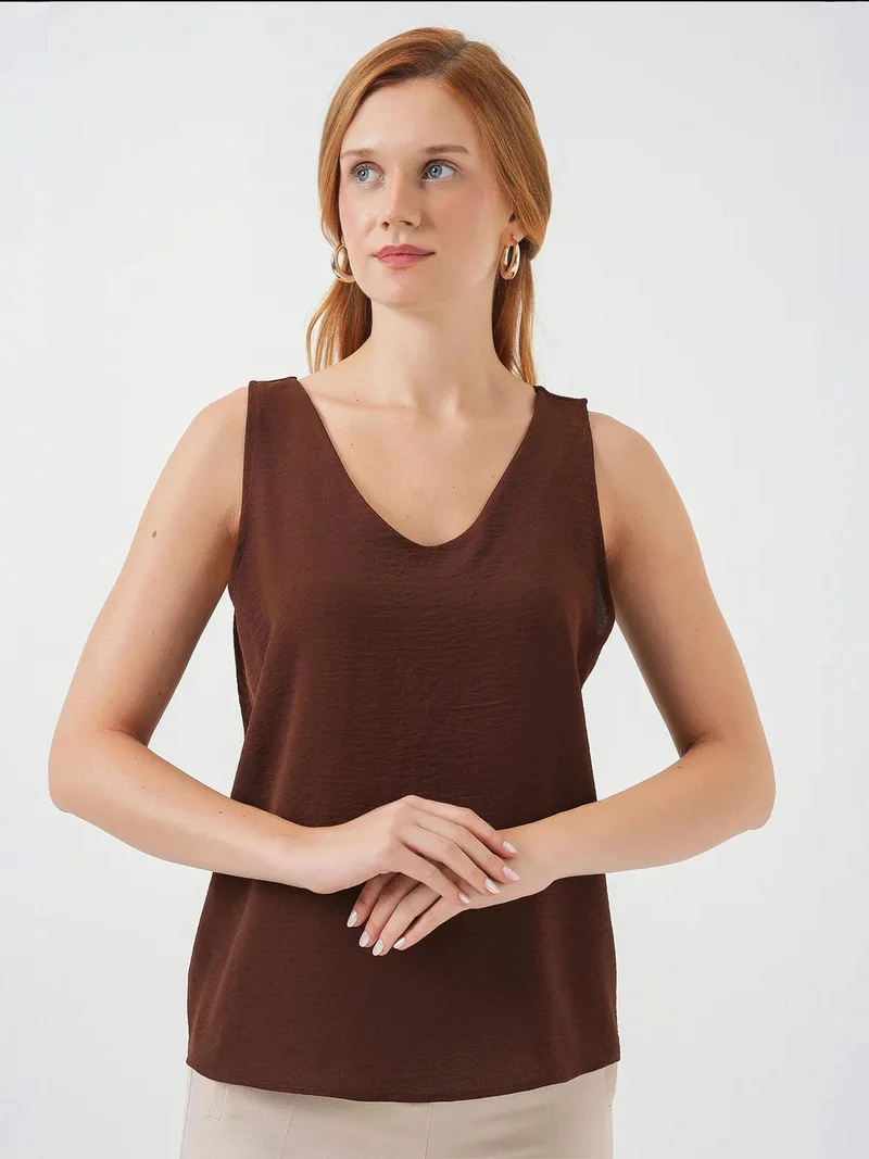 بيغ دارت بلوزة بياقة على شكل حرف  من