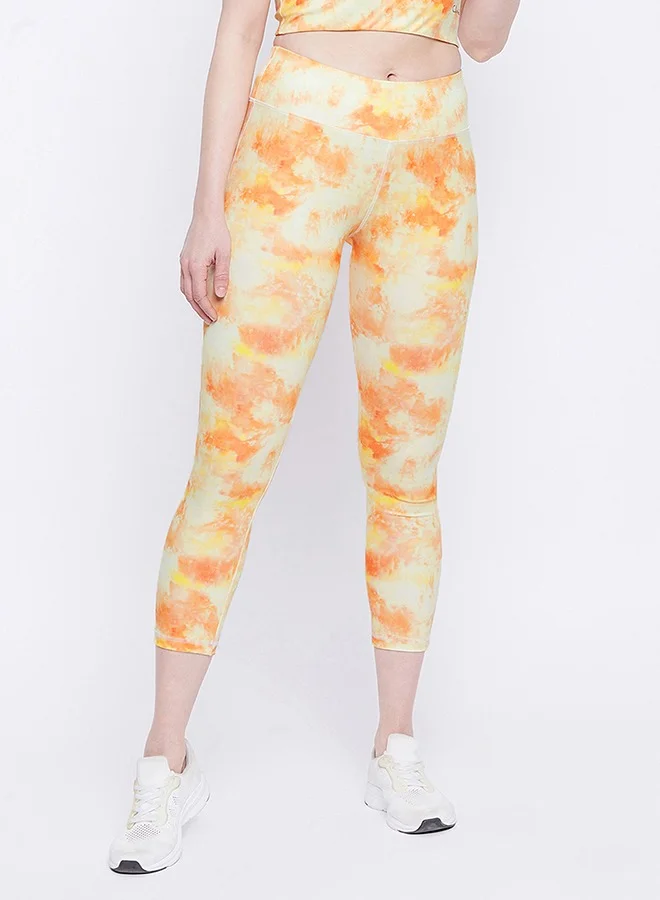 كلوفيا Clovia Snug Fit Active Ankle-Length Tie-Dye Tights in Peach Colour