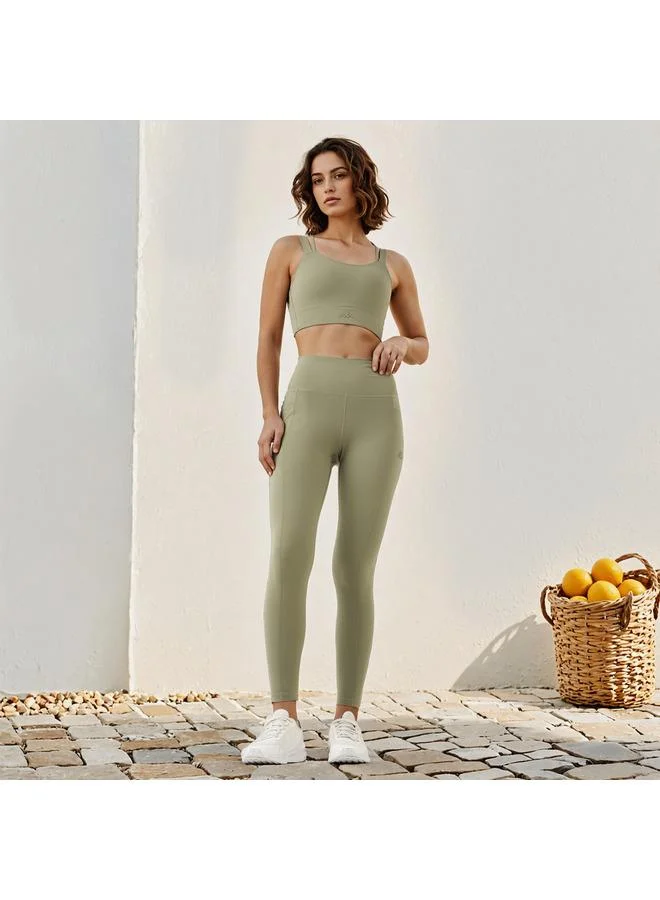 كابا حمالة صدر رياضية كابا بتفاصيل شعار وحمالات متقاطعة