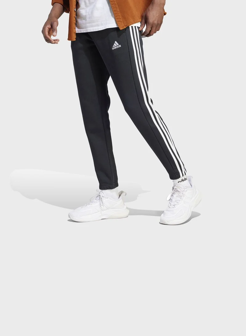 adidas بنطال Essentials Fleece 3-Stripes Tapered Cuff
