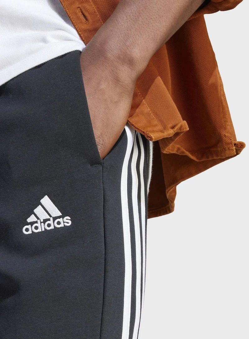 adidas بنطال Essentials Fleece 3-Stripes Tapered Cuff
