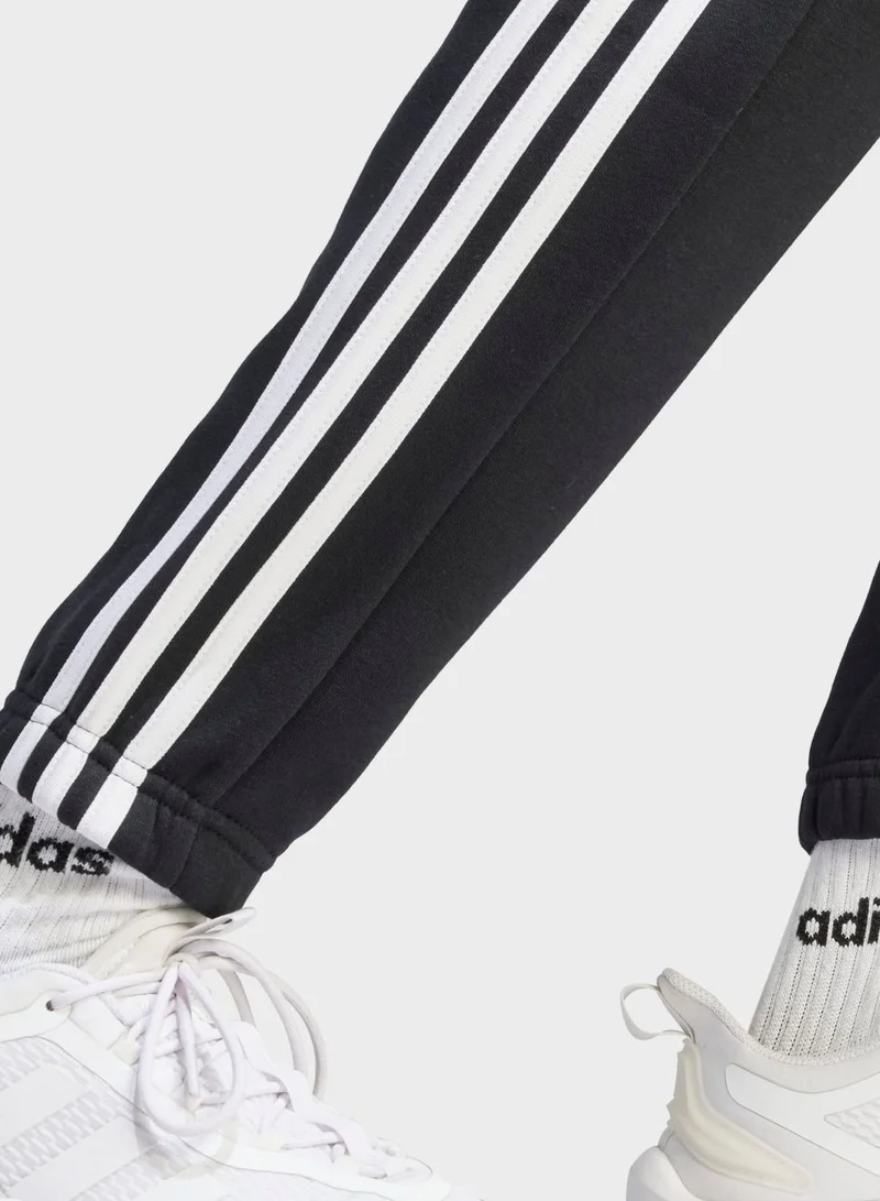 adidas بنطال Essentials Fleece 3-Stripes Tapered Cuff
