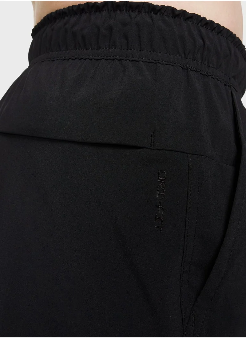 Nike Dri-Fit Unlimited Woven 7" Shorts