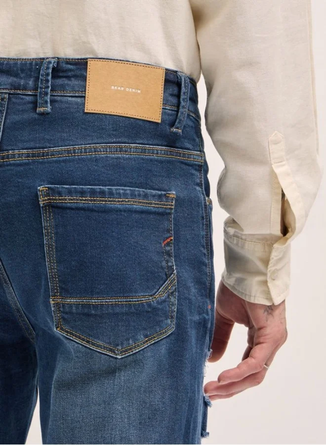 The Bear House  Men's Mid Blue with Light Fade Distressed Mid-Rise Slim Fit Jeans Classic Comfort With Modern Style, Perfect For Everyday Casual Looks And Effortless Streetwear Vibes for Men | Best Price UAE