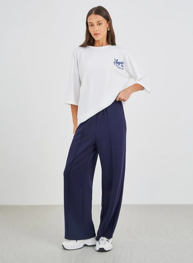 ستايلي Styli Slogan Print Round Neck Short Sleeve T-Shirt
