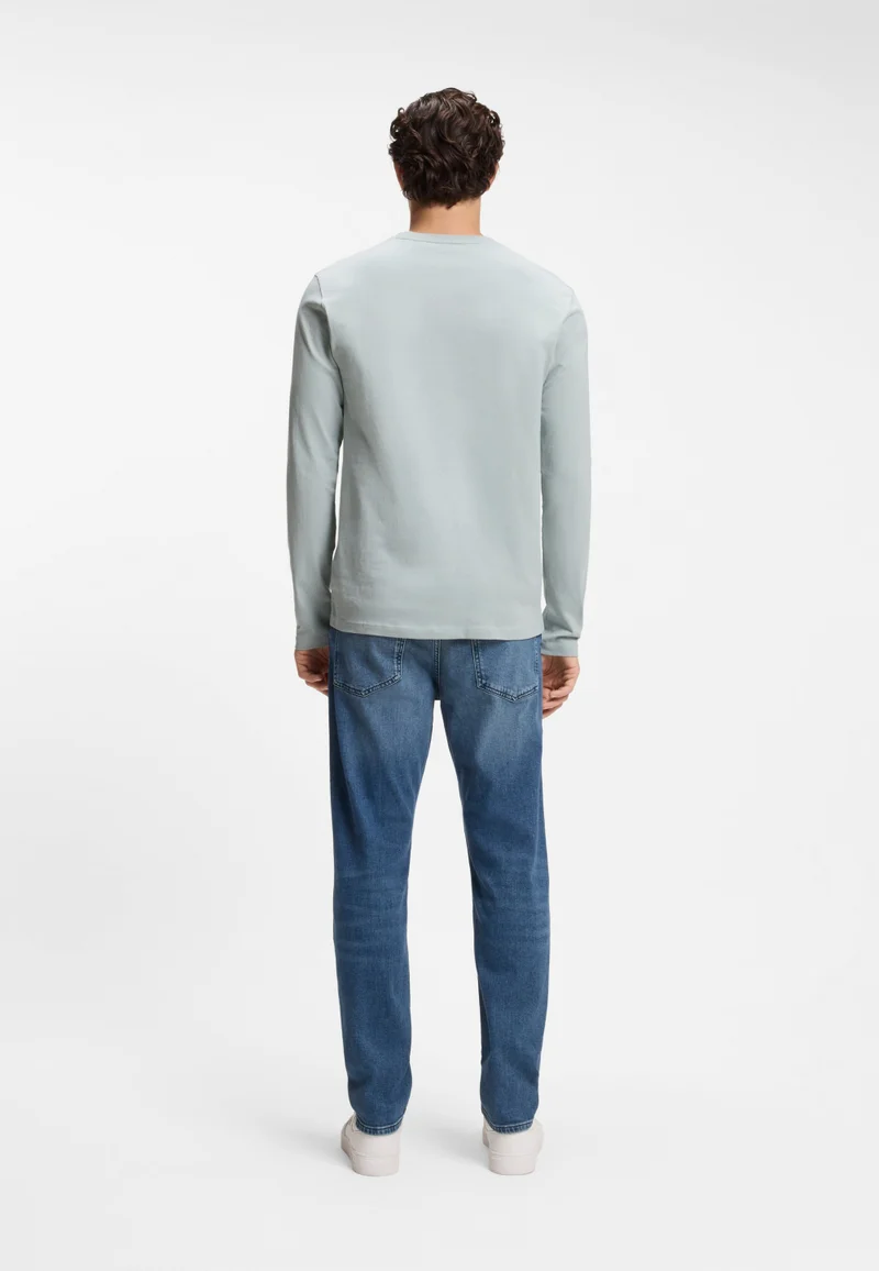 بوس تيشيرت قطني جيرسي مع رقعة شعار