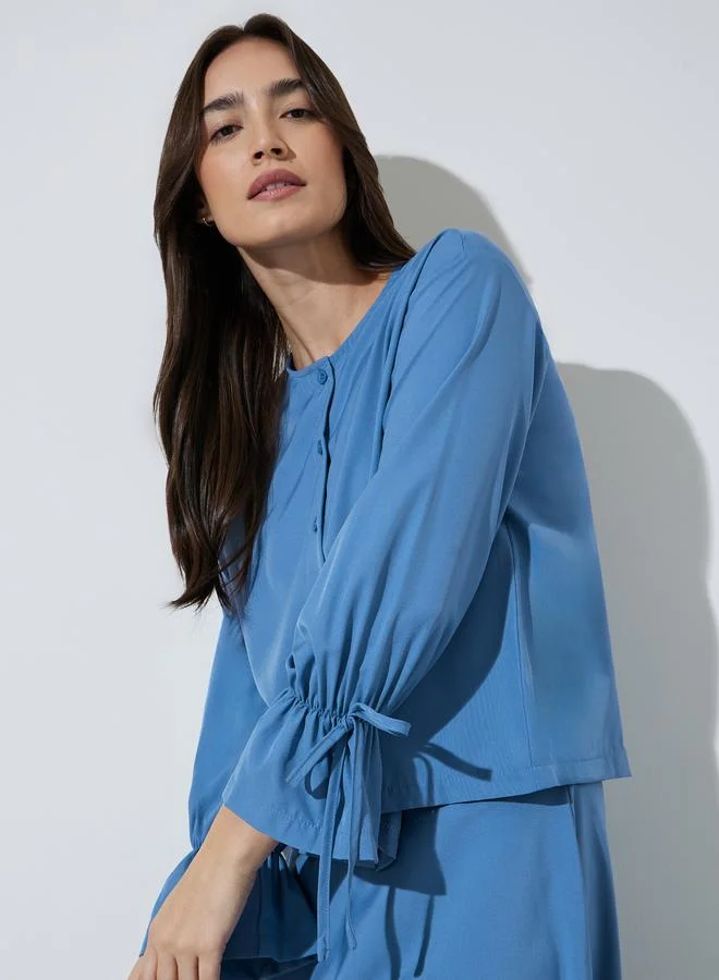 Styli Blue Solid Tie-Up Sleeves Top and A-Line Maxi Skirt Set