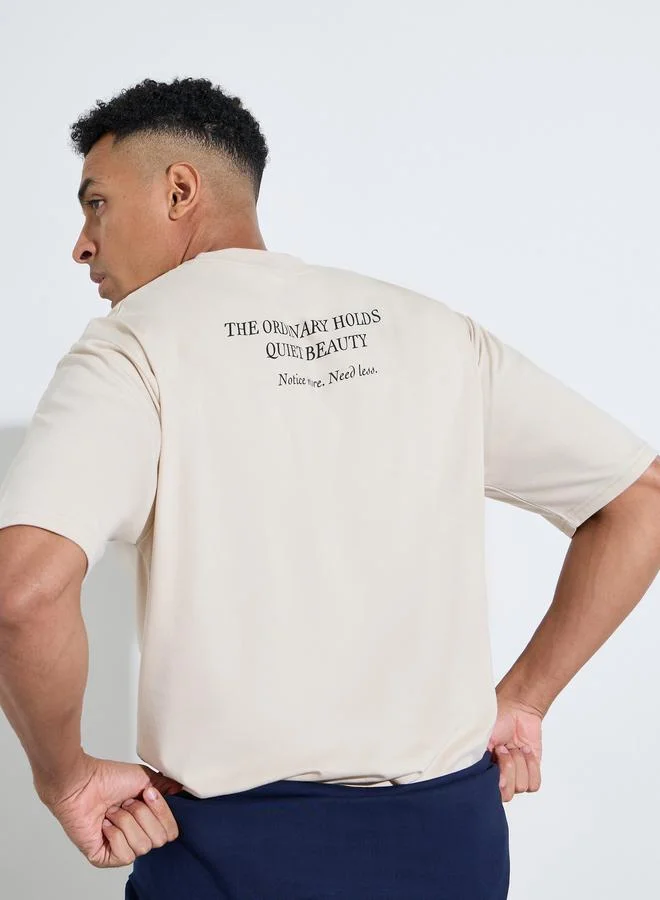 Styli Beige Slogan Print Crew Neck Oversized T-Shirt