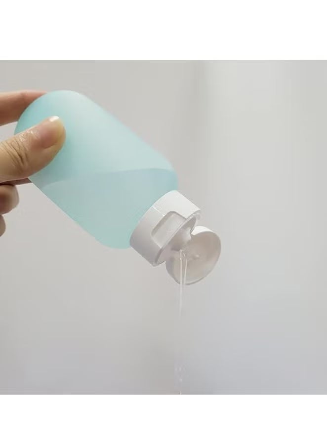 مجموعة من 3 زجاجات سفر بسعة 60 مل قابلة لاعادة الملء مع شنطة ، مثالية لتخزين الشامبو السائل والصابون ومستلزمات النظافة وردي أصفر أزرق 60ml للبالغين من الجنسين - Image 2