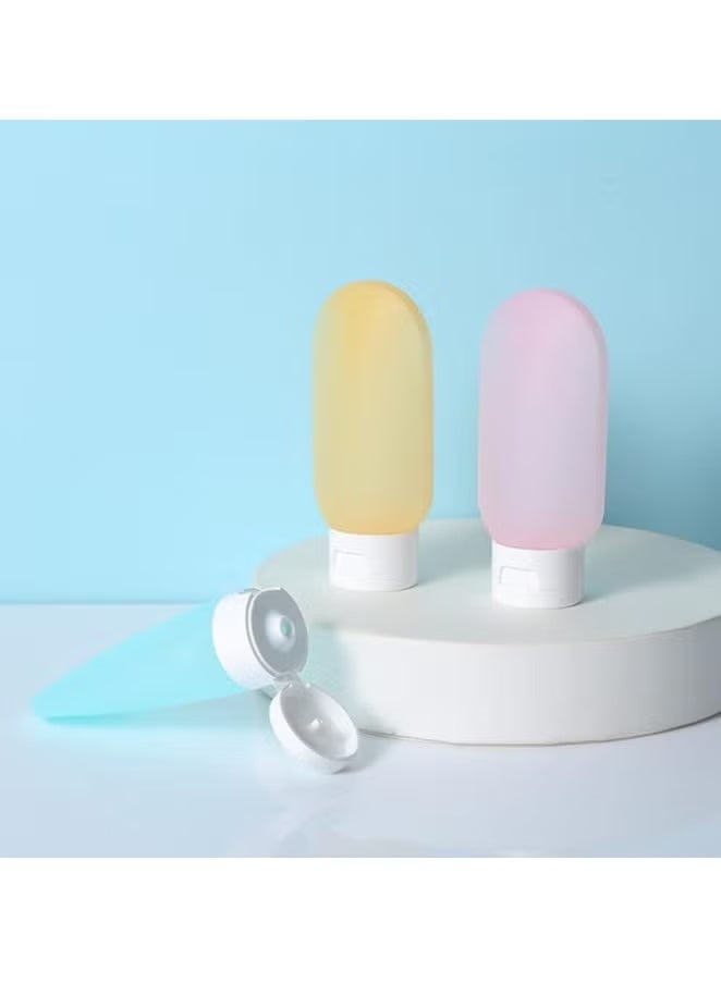 مجموعة من 3 زجاجات سفر بسعة 60 مل قابلة لاعادة الملء مع شنطة ، مثالية لتخزين الشامبو السائل والصابون ومستلزمات النظافة وردي أصفر أزرق 60ml للبالغين من الجنسين - Image 3