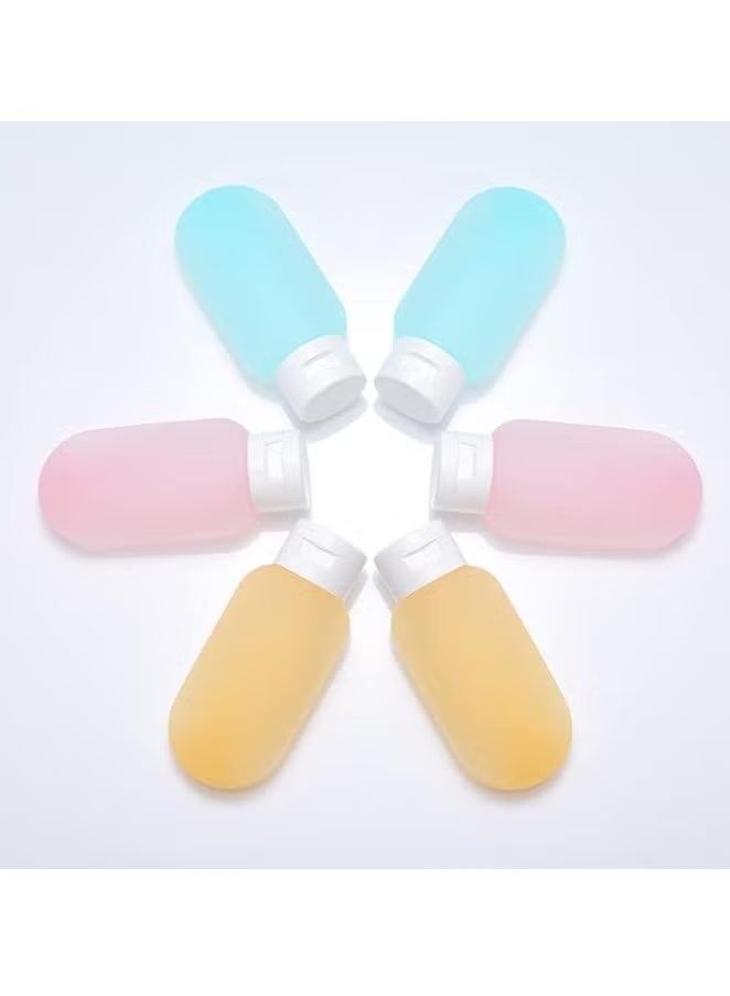 مجموعة من 3 زجاجات سفر بسعة 60 مل قابلة لاعادة الملء مع شنطة ، مثالية لتخزين الشامبو السائل والصابون ومستلزمات النظافة وردي أصفر أزرق 60ml للبالغين من الجنسين - Image 4