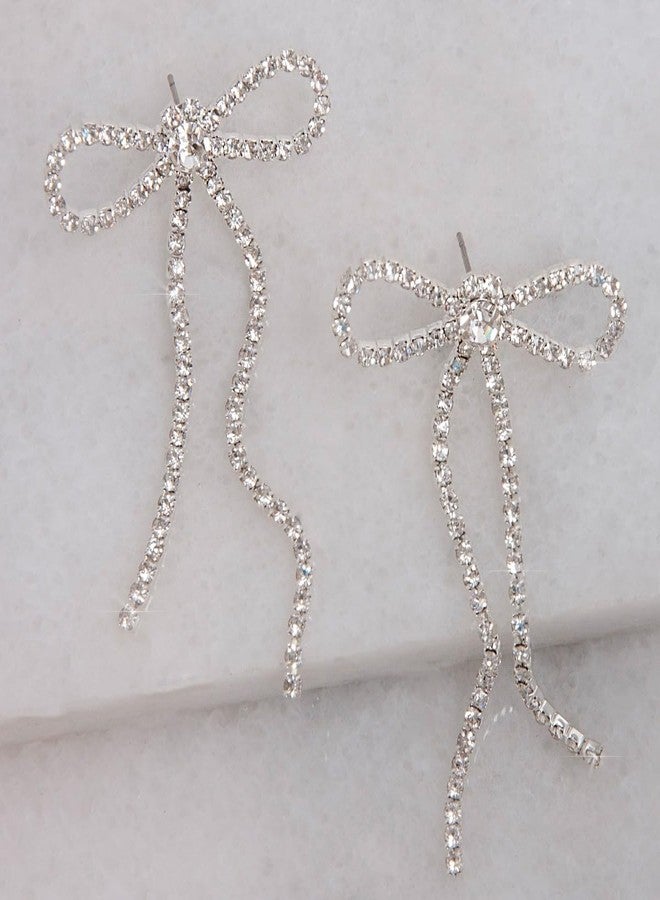 هامبل شيك نيويورك أقراط فيونكة فضية اللون للنساء - أقراط طويلة فضية اللون للنساء، أقراط فيونكة متدلية لامعة مع شرابات مرصعة بأحجار الراين، مجوهرات أنيقة وجذابة لحفلات التخرج أو العودة إلى الوطن - Image 3