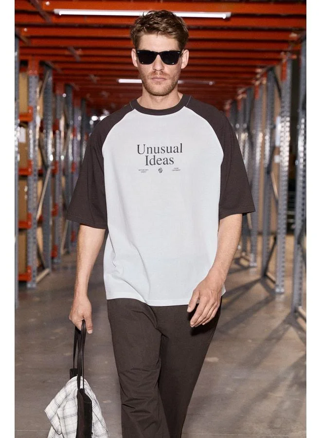 Grimelange PIMBA Men's 100% Organic Cotton T-Shirt with Contrast-Colored Cream/Brown Collar and Sleeves.