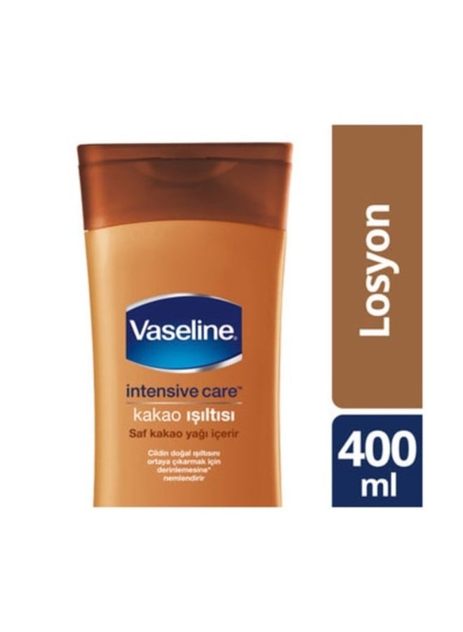 فازلين لوشن العناية المركزة بخلاصة الكاكاو المتألق مصنوع من زبدة الكاكاو النقية بنسبة 100% لتوهج طبيعي 400 مل