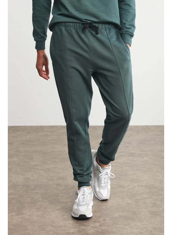 GRIMELANGE Fabian Men's Regular Fit Normal Cut Front Grooved Cord 3-Thread Lined Green Sweatpants.