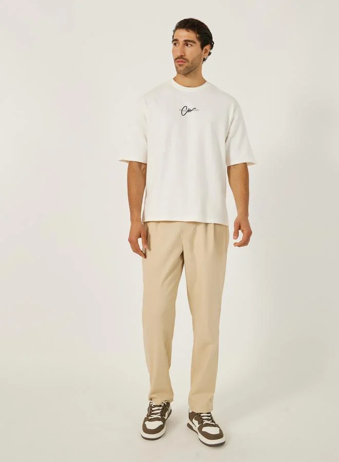 ستايلي Slogan Print Oversized Round Neck T-Shirt