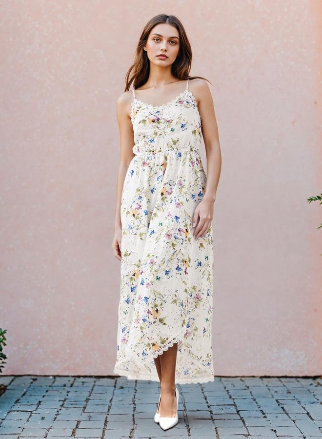تواكستريمز فستان ماكسي بدون أكمام بطبعة زهور ورقبة على شكل حرف  وتفاصيل شيفلي - Image 1